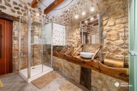 Historic house with stone facade and pool